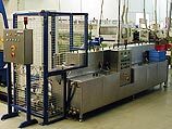 Complete TW 103 conveyor system with interlinked cleaning and transport unit