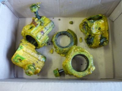 Clamp coupling heavily soiled with paint residue before paint stripping in the Clean-o-mat RC-E