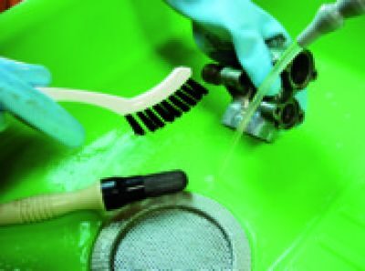 Spülsystem zur Nachreinigung von Werkstücken in einer PERKUTE Frontlader Reinigungsanlage